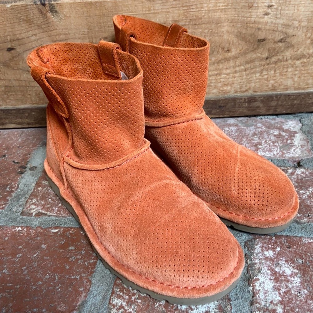 UGG Classic Mini Unlined coral leather boots.
